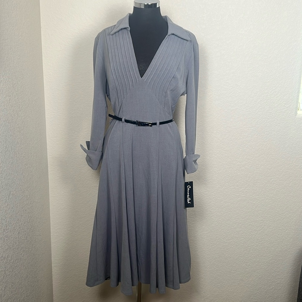 This is a grey vintage one of a kind 1940’s dress that can’t be found anywhere!
